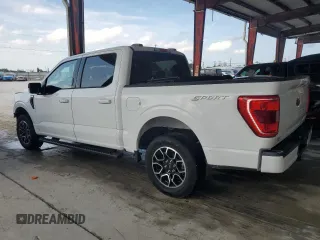2023 Ford F-150 XL with VIN 1FTEW1CP9PKD19429, listed as a Copart auction lot 58021125 with 13,678 mi miles and Salvage title. Bid and sale history available at DreamBid. Image 2.