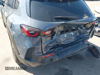 2025 Mazda CX-50 S Select z VIN 7MMVABAM9SN348045, wystawiony jako IAAI lot #42077636 z przebiegiem 2 211 mil mil oraz . Historia ofert i sprzedaży dostępna na DreamBid. Obrazek 6.