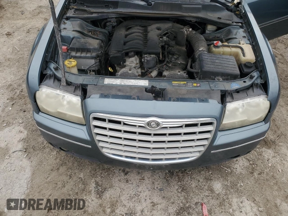 2005 Chrysler 300 with VIN 2C3JA53G65H651700, listed as a Copart auction lot 41861225 with 247,771 mi miles and Salvage Title. Bid and sale history available at carsss.com. Image 11.