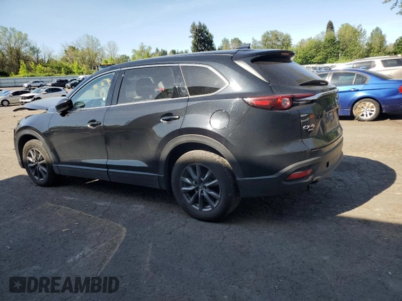 2023 Mazda CX-9 Touring with VIN JM3TCBCY0P0656475, listed as a Copart auction lot 56381365 with 49,716 mi miles and Non repairable. Bid and sale history available at DreamBid. Image 2.