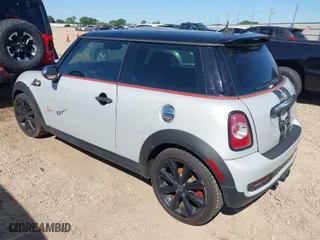 2013 MINI Cooper Hardtop S with VIN WMWSV3C50DT389419, listed as a IAAI auction lot 42027558 with 160,453 mi miles. Bid and sale history available at carsss.com. Image 3.