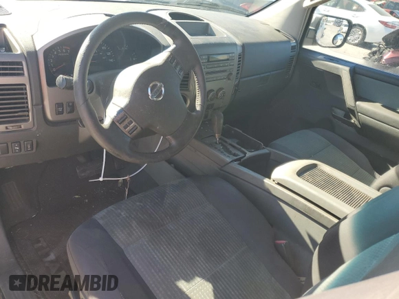 2005 Nissan Titan SE z VIN 1N6AA06AX5N500773, wystawiony jako Copart lot #81695634 z przebiegiem 127 210 mil mil oraz Szkoda całkowita • Salvage title. Historia ofert i sprzedaży dostępna na DreamBid. Obrazek 8.