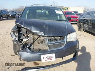 2013 Dodge Grand Caravan SXT with VIN 2C4RDGCG4DR602893, listed as a IAAI auction lot 41747242 with 206,213 mi miles and . Bid and sale history available at DreamBid. Image 12.
