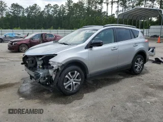 2018 Toyota RAV4 LE with VIN JTMBFREV2JJ211129, listed as a Copart auction lot 58540875 with 99,885 mi miles and Salvage title. Bid and sale history available at DreamBid. Image 1.