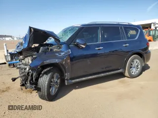 2019 Infiniti QX80 LUXE with VIN JN8AZ2NE5K9226631, listed as a Copart auction lot 52703205 with 99,043 mi miles and Salvage Title. Bid and sale history available at carsss.com. Image 1.