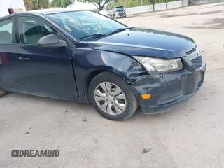 2014 Chevrolet Cruze LS with VIN 1G1PA5SH1E7437248, listed as a IAAI auction lot 42228070 with 128,427 mi miles and . Bid and sale history available at DreamBid. Image 6.