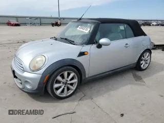 2011 MINI Convertible with VIN WMWZN3C53BTZ89332, listed as a Copart auction lot 45945515 with 25,809 mi miles and Salvage Title. Bid and sale history available at DreamBid. Image 1.