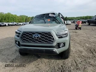 2023 Toyota Tacoma SR z VIN 3TMCZ5ANXPM622882, wystawiony jako Copart lot #53085845 z przebiegiem 11 207 mil mil oraz Szkoda całkowita • Salvage title. Historia ofert i sprzedaży dostępna na DreamBid. Obrazek 11.