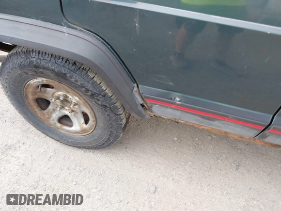 1993 Jeep Cherokee Sport with VIN 1J4FJ68S2PL622716, listed as a IAAI auction lot 42570145 with 183,159 mi miles and . Bid and sale history available at DreamBid. Image 6.
