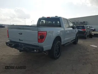 2023 Ford F-150 XL with VIN 1FTFW1E84PFA28761, listed as a IAAI auction lot 41532863 with 32,929 mi miles. Bid and sale history available at carsss.com. Image 4.