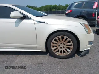 2012 Cadillac CTS Premium z VIN 1G6DP1E3XC0108543, wystawiony jako IAAI lot #42413547 z przebiegiem 80 570 mil mil oraz . Historia ofert i sprzedaży dostępna na DreamBid. Obrazek 12.