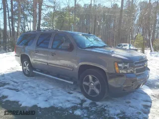 2013 Chevrolet Suburban LT with VIN 1GNSCJE08DR112648, listed as a IAAI auction lot 41623996 with 147,440 mi miles. Bid and sale history available at carsss.com. Image 1.