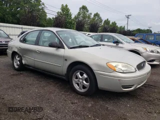2004 Ford Taurus SES with VIN 1FAFP55S54A194897, listed as a Copart auction lot 63565945 with 131,294 mi miles and Salvage title. Bid and sale history available at DreamBid. Image 4.