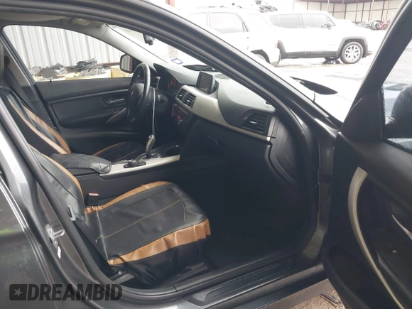 2014 BMW 3 Series 320i xDrive with VIN WBA3C3G5XENS67385, listed as a IAAI auction lot 42148360 with 98,216 mi miles and . Bid and sale history available at DreamBid. Image 5.