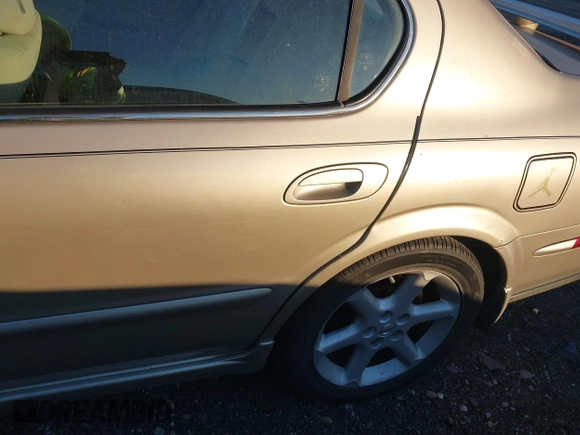 2003 Nissan Maxima SE z VIN JN1DA31D83T502519, wystawiony jako IAAI lot #41104746 z przebiegiem Nie podano mil oraz . Historia ofert i sprzedaży dostępna na DreamBid. Obrazek 6.