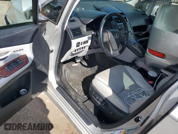 2010 Lexus HS 250h with VIN JTHBB1BA7A2002122, listed as a Copart auction lot 87453034 with Not Provided miles and Salvage Title. Bid and sale history available at DreamBid. Image 8.