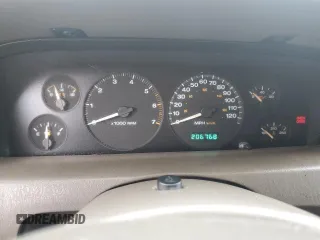 1999 Jeep Grand Cherokee Limited with VIN 1J4G268S3XC728805, listed as a Copart auction lot 79878974 with 206,768 mi miles and Salvage title. Bid and sale history available at DreamBid. Image 9.