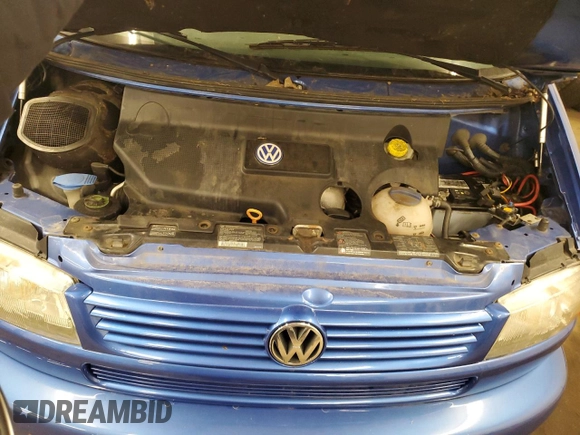 2003 Volkswagen EuroVan с VIN WV2KB47053H044308, выставлен на аукционе Copart как лот 81267494 с пробегом 174 679 миль миль и Чистый • Clean title. История ставок и продаж доступна на DreamBid. Изображение 12.