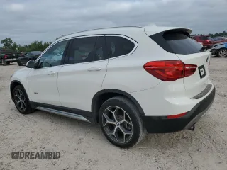 2017 BMW X1 sDrive28i with VIN WBXHU7C37H5H34418, listed as a Copart auction lot 53073995 with 67,980 mi miles and Salvage Title. Bid and sale history available at carsss.com. Image 2.