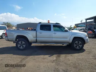 2013 Toyota Tacoma with VIN 3TMMU4FN9DM050012, listed as a IAAI auction lot 41369358 with 95,292 mi miles. Bid and sale history available at carsss.com. Image 13.