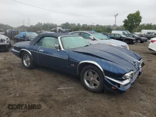 1995 Jaguar XJS with VIN SAJNX2741SC198516, listed as a Copart auction lot 69795314 with 75,227 mi miles and Salvage Title. Bid and sale history available at carsss.com. Image 4.