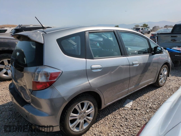 2010 Honda Fit Sport with VIN JHMGE8H41AC002070, listed as a Copart auction lot 62356565 with 148,279 mi miles and Salvage title. Bid and sale history available at DreamBid. Image 3.