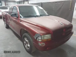 1999 Dodge Dakota SLT z VIN 1B7GL22XXXS240005, wystawiony jako IAAI lot #42269211 z przebiegiem 218 163 mil mil oraz . Historia ofert i sprzedaży dostępna na DreamBid. Obrazek 1.