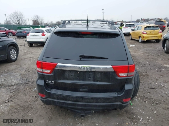 2011 Jeep Grand Cherokee Laredo with VIN 1J4RR4GGXBC511475, listed as a IAAI auction lot 41554620 with 164,361 mi miles. Bid and sale history available at carsss.com. Image 16.