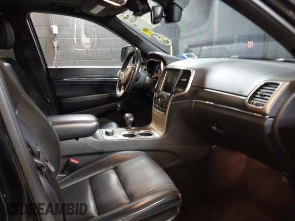 2015 Jeep Grand Cherokee Limited with VIN 1C4RJFBG8FC762873, listed as a IAAI auction lot 42098428 with 244,676 mi miles. Bid and sale history available at carsss.com. Image 5.