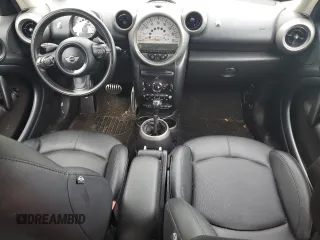 2011 MINI Countryman S z VIN WMWZC5C56BWL53827, wystawiony jako Copart lot #58953505 z przebiegiem Nie podano mil oraz Szkody całkowita. Historia ofert i sprzedaży dostępna na DreamBid. Obrazek 8.