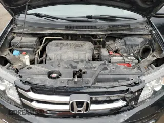 2015 Honda Odyssey Touring Elite with VIN 5FNRL5H91FB504095, listed as a Copart auction lot 53868125 with 176,272 mi miles and Salvage Title. Bid and sale history available at DreamBid. Image 12.
