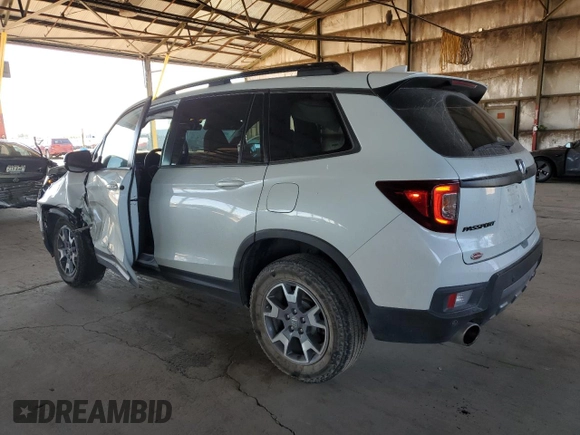 2023 Honda Passport TrailSport z VIN 5FNYF8H68PB000476, wystawiony jako Copart lot #55079045 z przebiegiem 30 543 mil mil oraz Szkoda całkowita • Salvage title. Historia ofert i sprzedaży dostępna na DreamBid. Obrazek 2.