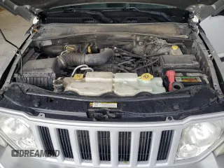 2011 Jeep Liberty Sport z VIN 1J4PN2GK6BW502136, wystawiony jako Copart lot #55778415 z przebiegiem 151 295 mil mil oraz Szkoda całkowita • Salvage title. Historia ofert i sprzedaży dostępna na DreamBid. Obrazek 12.