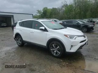 2018 Toyota RAV4 XLE with VIN 2T3WFREV9JW405921, listed as a Copart auction lot 50695175 with 133,019 mi miles and Salvage Title. Bid and sale history available at carsss.com. Image 14.