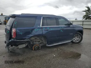 2017 GMC Yukon SLT with VIN 1GKS1BKC5HR295827, listed as a Copart auction lot 48189565 with 106,867 mi miles and Salvage Title. Bid and sale history available at carsss.com. Image 3.