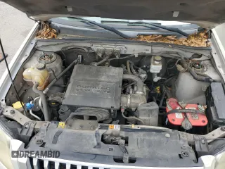 2009 Mercury Mariner Premier with VIN 4M2CU87GX9KJ20726, listed as a Copart auction lot 58690305 with 174,698 mi miles and Salvage title. Bid and sale history available at DreamBid. Image 12.