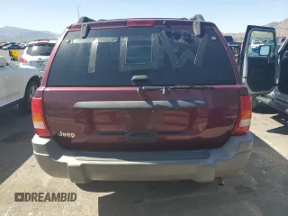2000 Jeep Grand Cherokee Laredo with VIN 1J4G248S1YC407769, listed as a Copart auction lot 61653545 with 188,882 mi miles and Salvage title. Bid and sale history available at DreamBid. Image 6.