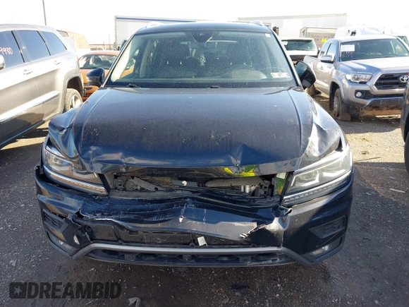 2018 Volkswagen Tiguan SEL Premium with VIN 3VV5B7AX8JM073475, listed as a IAAI auction lot 41816194 with 65,838 mi miles and . Bid and sale history available at DreamBid. Image 12.