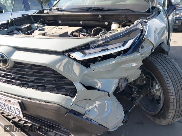 2023 Toyota RAV4 XLE Premium z VIN JTMA1RFV7PJ041609, wystawiony jako IAAI lot #41861931 z przebiegiem 18 862 mil mil oraz . Historia ofert i sprzedaży dostępna na DreamBid. Obrazek 19.