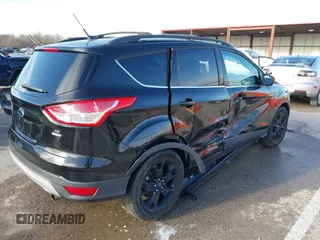 2013 Ford Escape SE with VIN 1FMCU9GX9DUB92246, listed as a IAAI auction lot 41808372 with 73,472 mi miles. Bid and sale history available at carsss.com. Image 4.