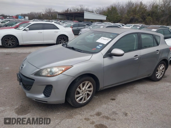 2012 Mazda Mazda3 i Touring with VIN JM1BL1L7XC1664299, listed as a IAAI auction lot 41568259 with 198,926 mi miles. Bid and sale history available at carsss.com. Image 2.