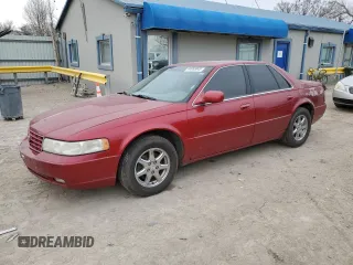 1999 Cadillac Seville Touring STS z VIN 1G6KY5494XU915169, wystawiony jako Copart lot #44065845 z przebiegiem 114 030 mil mil oraz Szkoda całkowita • Salvage title. Historia ofert i sprzedaży dostępna na DreamBid. Obrazek 1.