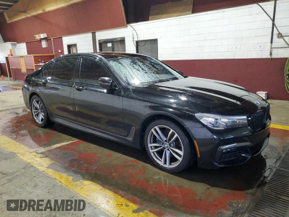 2019 BMW 7 Series 740i xDrive with VIN WBA7E4C50KGV28708, listed as a Copart auction lot 55141895 with 130,925 mi miles and Clean title. Bid and sale history available at DreamBid. Image 4.