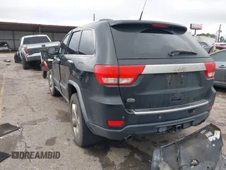2011 Jeep Grand Cherokee Overland with VIN 1J4RS6GT7BC518123, listed as a IAAI auction lot 41277374 with 163,752 mi miles and . Bid and sale history available at DreamBid. Image 3.