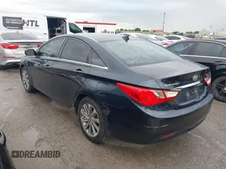 2013 Hyundai Sonata GLS with VIN 5NPEB4AC3DH504969, listed as a IAAI auction lot 42184048 with 153,702 mi miles and . Bid and sale history available at carsss.com. Image 3.