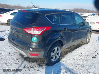 2015 Ford Escape SE with VIN 1FMCU0G74FUB57399, listed as a IAAI auction lot 41356046 with 179,713 mi miles. Bid and sale history available at carsss.com. Image 4.