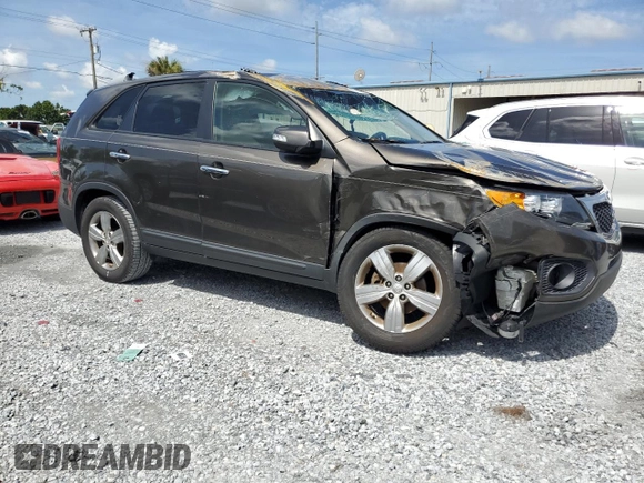2012 Kia Sorento EX with VIN 5XYKU3A67CG273792, listed as a Copart auction lot 63869745 with Not provided miles and Salvage title. Bid and sale history available at DreamBid. Image 4.