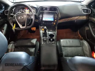 2017 Nissan Maxima SV с VIN 1N4AA6AP8HC397053, выставлен на аукционе Copart как лот 52609685 с пробегом 149 562 миль миль и Списание • Salvage title. История ставок и продаж доступна на DreamBid. Изображение 8.