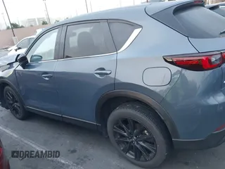 2024 Mazda CX-5 S Carbon Edition z VIN JM3KFBCM6R0359097, wystawiony jako IAAI lot #41743569 z przebiegiem 13 114 mil mil oraz . Historia ofert i sprzedaży dostępna na DreamBid. Obrazek 15.