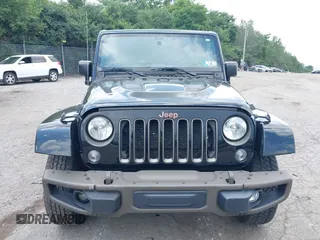 2016 Jeep Wrangler Unlimited Sahara z VIN 1C4HJWEG3GL343340, wystawiony jako IAAI lot #42683859 z przebiegiem 92 878 mil mil oraz . Historia ofert i sprzedaży dostępna na DreamBid. Obrazek 6.